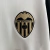 camisa-valencia-home-titular-i-1-branca-preta-dourada-24-25-puma-torcedor-masculina-gola-redonda-tm-real-estate-group-divina-seguros-4.jpg