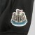 camisa-newcastle-home-titular-i-1-preto-branco-24-25-adidas-torcedor-unissex-gola-v-sela-noon-kit-infantil-short-preto-7.jpg