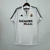 Camisa oficial do Real Madrid, modelo retrô, temporada 03/04, Comemore o título da Champions League com a camisa do Real Madrid, Produto licenciado e de alta qualidade, Garanta sua camisa do Real Madrid na versão retrô, Perfeita para os fãs e colecionador