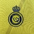 Camisa Al-Nassr Home 22/23 para torcedores masculinos. 2. Modelo amarelo para demonstrar amor pelo time. 3. Conforto e estilo com a Camisa Al-Nassr Home 22/23. 4. Mostre sua paixão pelo Al-Nassr com a Camisa Home. 5. Camisa oficial do Al-Nassr para a temp