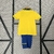 Kit Infantil Brasil Home 93/94 Retrô - Amarelo vibrante - Uniforme completo - Design retrô - Qualidade garantida - Conforto para crianças - Torça pelo Brasil - Versão infantil - Fiel às cores da seleção - Ícone do futebol - Perfeito para presentear - Esti