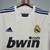 Camisa Real Madrid Home Retro 10/11, camisa oficial do Real Madrid, camisa retrô do Real Madrid, camisa de futebol do Real Madrid, camisa do Real Madrid 2010/2011, camisa branca do Real Madrid, camisa do Real Madrid clássica, camisa de colecionador do Rea