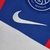 Camisa oficial do Paris Saint Germain, Terceiro uniforme, Modelo masculino, Branco com detalhes em azul e vermelho, Para torcedores apaixonados, Camisa de alta qualidade, Conforto e estilo garantidos, Com o escudo do PSG, Ideal para usar em jogos e no dia