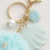 Chaveiro dourado pompom concha fofo - comprar online