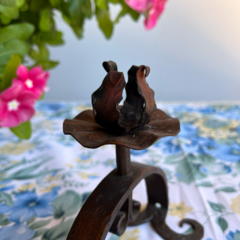 ANTIGUO CANDELABRO DE HIERRO en internet