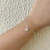 Pulseira Florzinha com Zircônias Banhada a Prata 70