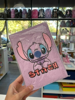 Cuaderno stitch con peluche