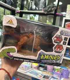 Juguete dinosaurio con luz y sonido