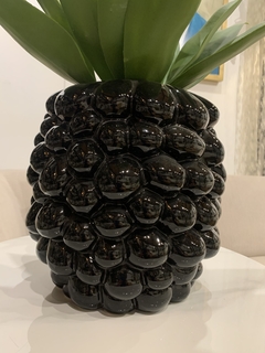 Florero globo negro en internet