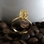 Anel cafezin com banho de ouro.