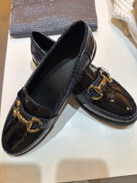 Mocasines con detalle metálico