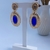 BRINCO TRABALHADO CRISTAL AZUL FACETADA SEMIJOIA - Vix joias e pratas