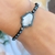 PULSEIRA SHAMBALA MÃO DE HANSA PRATA925 RODINADA - comprar online