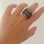 ANEL LARGO CRISTAL QUARTZO ROSA RÓDIO NEGRO - comprar online