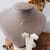 CONJUNTO BRINCO E COLAR CORAÇÃO SEMIJOIA 30cm