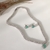 CONJUNTO RIVIERA BRINCO E COLAR RÓDIO BRANCO na internet