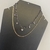 GARGANTILHA CHOCKER CORAÇÕES RÓDIO NEGRO 40cm na internet