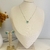CONJUNTO BRINCO E COLAR CORAÇÃO RÓDIO BRANCO