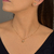 Conjunto Colar e Brinco Mãe de Pet Patinhas e Ponto de luz Banhado a Ouro 18k - buy online