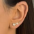 Brinco Feminino Trio Corações Cravejado Amoeto Banhado a Ouro18k