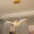 Lustre Pendente Moderno Nó Duplo Dourado 50w luz 3/1 - loja online