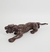 Escultura de madeira minuciiosamente entalhadada representando pantera em posição de ataque. Medidas 12 x 62 x 16 cm. - loja online