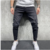 Calça jeans fashion rasgado slim 2023 - loja online
