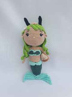 Boneca Capricórnio na internet