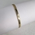 Bracelete Pulseira de Metal Dourado Acabamento Pontilhado