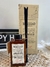 Difusor aromático de varilla Marchand con frasco de vidrio y caja decorativa.