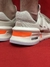 New Balance 997 - Bege e Laranja na internet