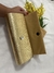 Clutch dourada na internet