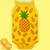 Body bebê amarelo com estampa de abacaxi, ideal para o verão.