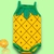 Body infantil amarelo com estampa de abacaxi e detalhes verdes.