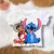 Camiseta infantil branca com estampa de Lilo e Stitch, personagens da Disney.
