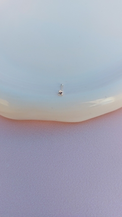 Piercing con piedrita en internet