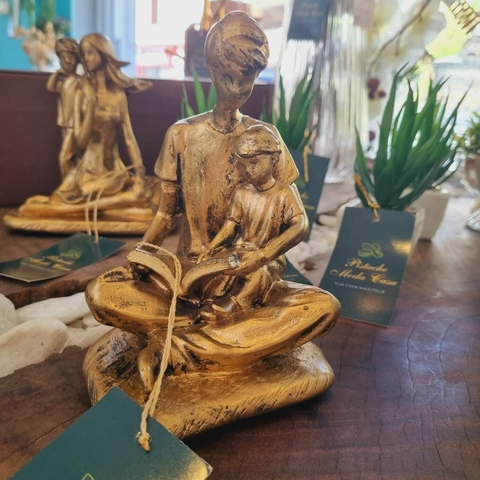 Estatua Dourada Pai e Filho