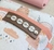 Kit Porta Fraldas e Trocador Portátil - Arco Íris Rosa na internet