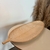 Centro de mesa em formato de folha Bege - 58x21x2,5cm na internet