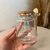 Pote de vidro com colher "o ingrediente que mais contagia é a alegria" - 240ml - comprar online