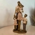 Escultura Estatueta Família Casal três filhos em resina - 12,5x8,5x25,5cm - comprar online