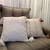 Capa de almofada Puxadinha Dupla Face com Pompom 45x45cm - Marrom - loja online