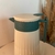 Garrafa térmica 1 litro - Bege com Verde na internet
