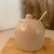 Açucareiro bege em porcelana com colher