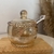 Meleira de Cristal com Colher Pearl Âmbar 10cm x 10cm x 11,5cm