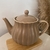 Bule de Chá de Porcelana Pétala Areia Matt 950ml