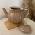 Bule de Chá de Porcelana Pétala Areia Matt 950ml na internet