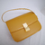 Bolsa Celine Box amarelo na internet
