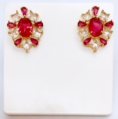 Brinco dourado botão com zircônias rosa e pink na internet