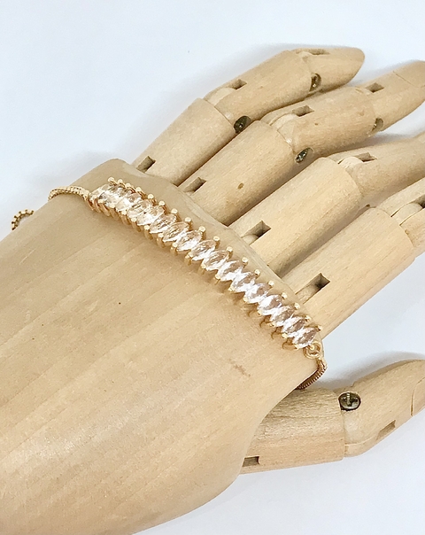Pulseira dourada com zircônia navete cristal fecho gravata